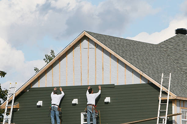 Professional Siding Contractor technician working in Glen Head, NY